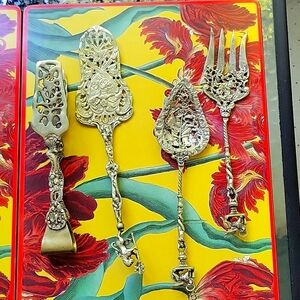 Set of 4 antique reproduction Renaissance serve ware.